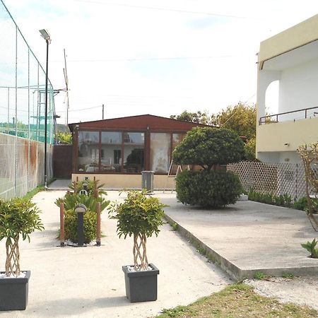 Evi Apartments And Studios เธโอโลกอส ภายนอก รูปภาพ