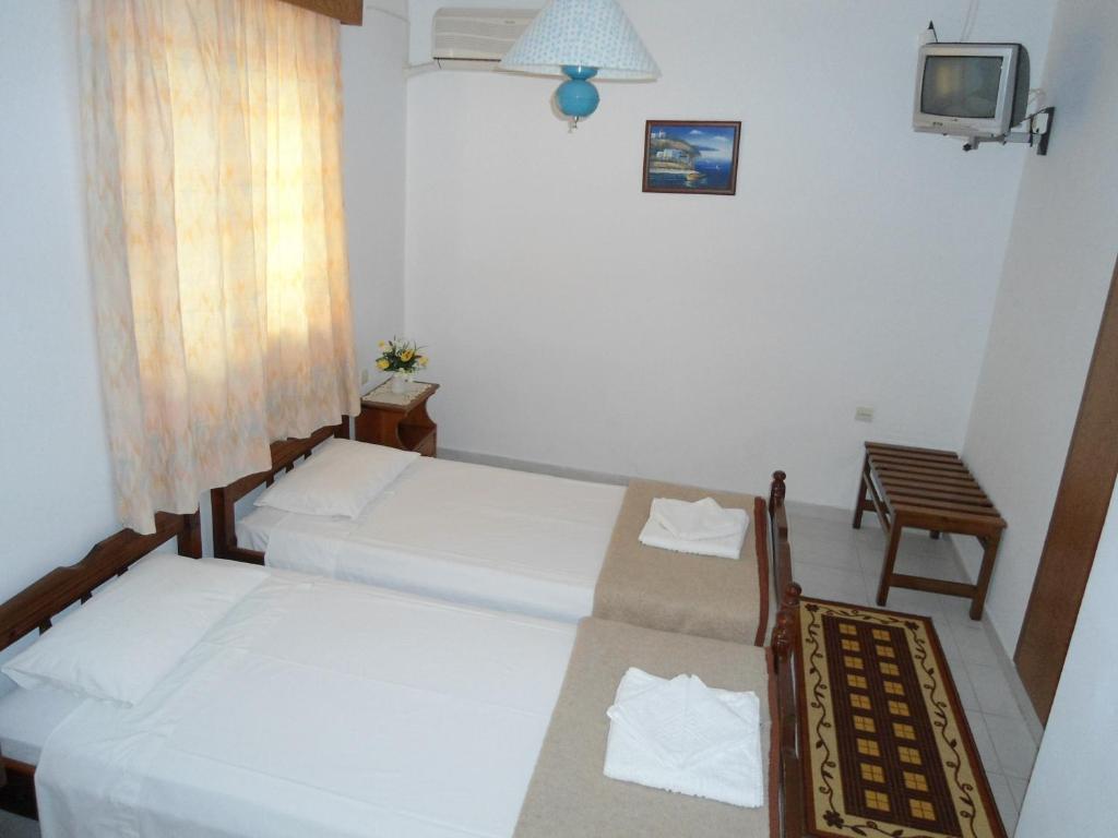Evi Apartments And Studios เธโอโลกอส ห้อง รูปภาพ