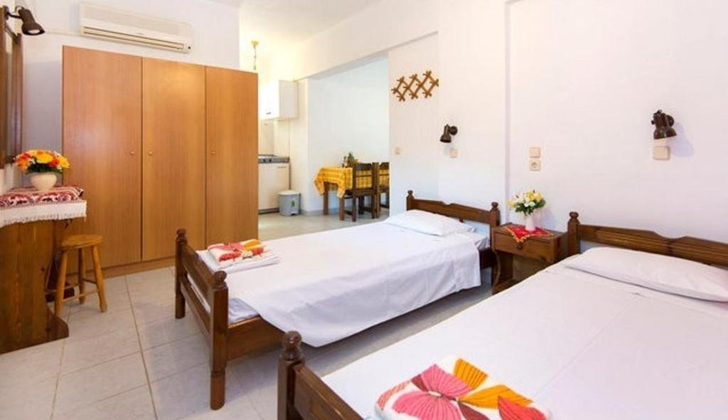 Evi Apartments And Studios เธโอโลกอส ห้อง รูปภาพ